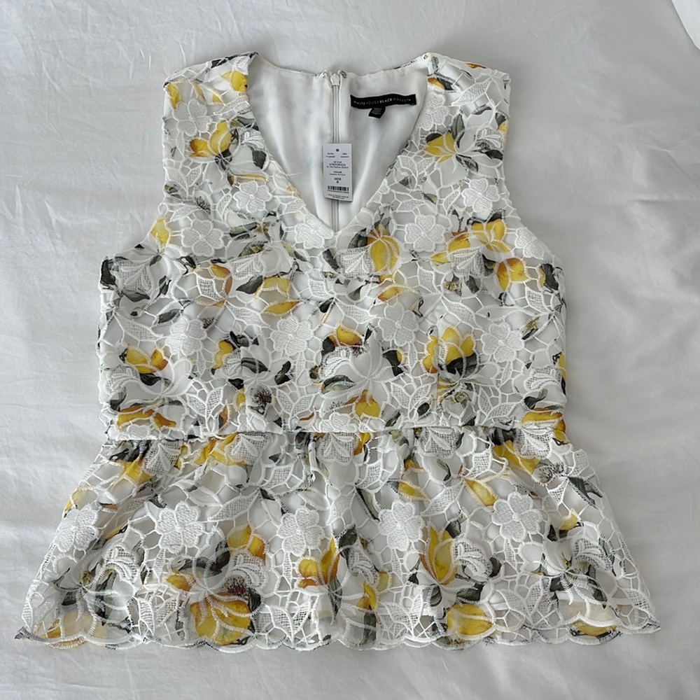 Brand new lemon lace shirt. Never worn before! Beautiful and unique.